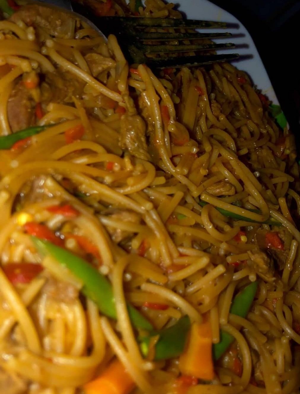 Jollof spaghetti with beef 