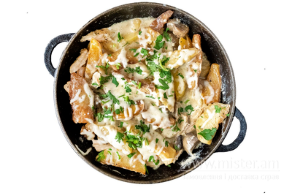Пательня з куркою та грибами