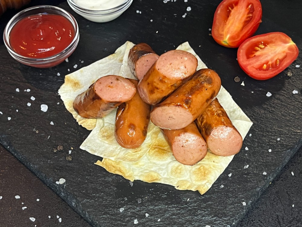 Молочні ковбаски
