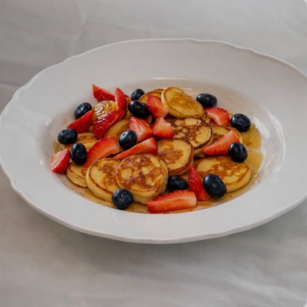 Mini oladky with fresh berries 