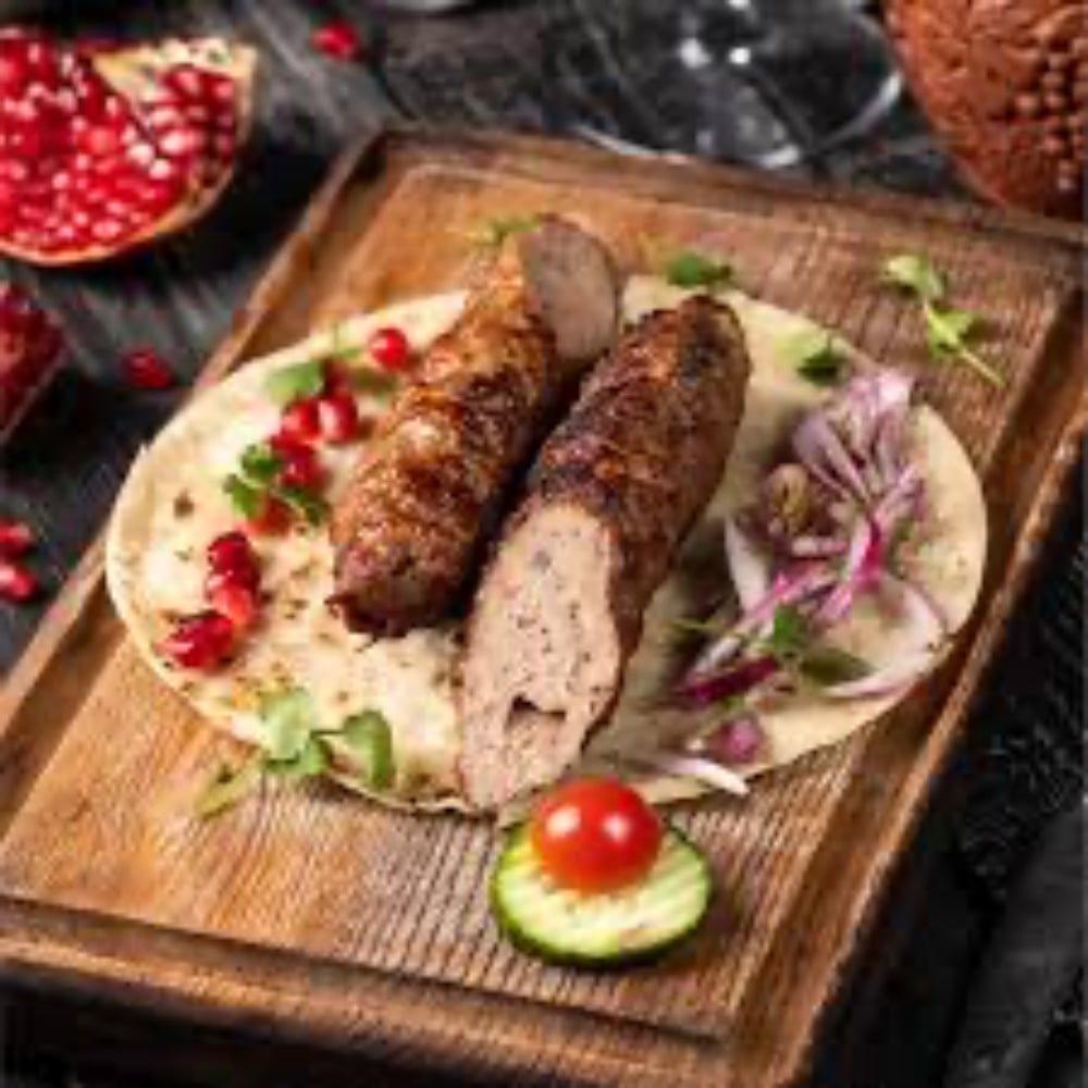 Кебаб по-грузинські зі свинини, яловичини та курки 200/40/40г.